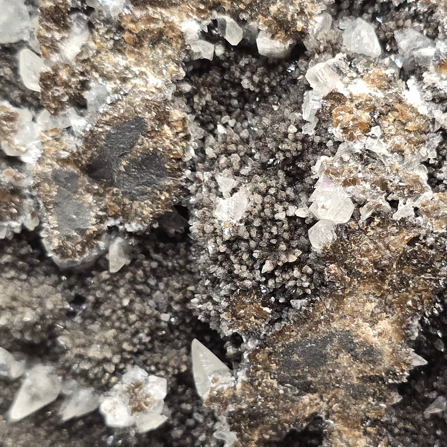 Dogtooth calcite on Iridescent calcite Oskaloosa Iowa