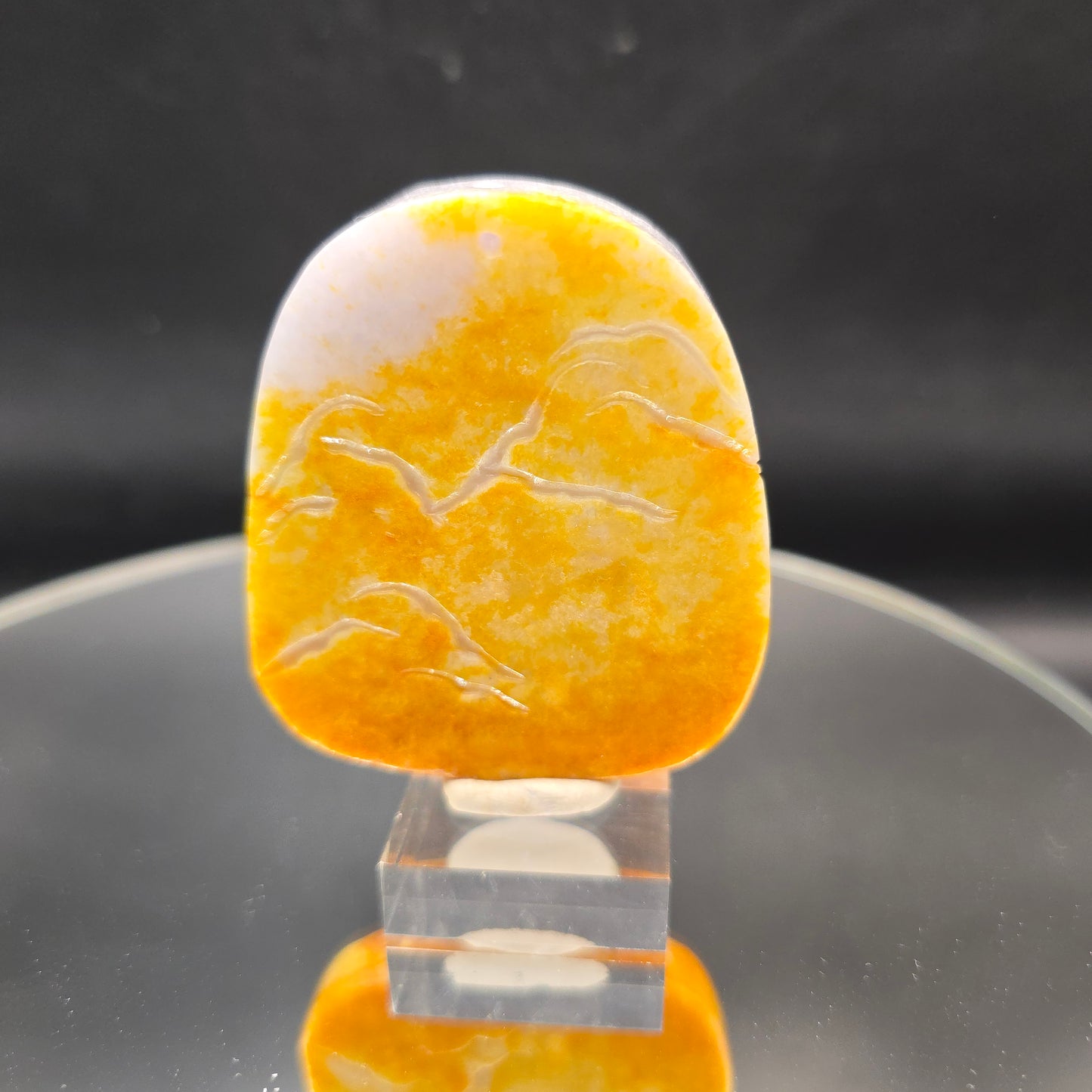 Lavender and yellow Jade Buddha carving