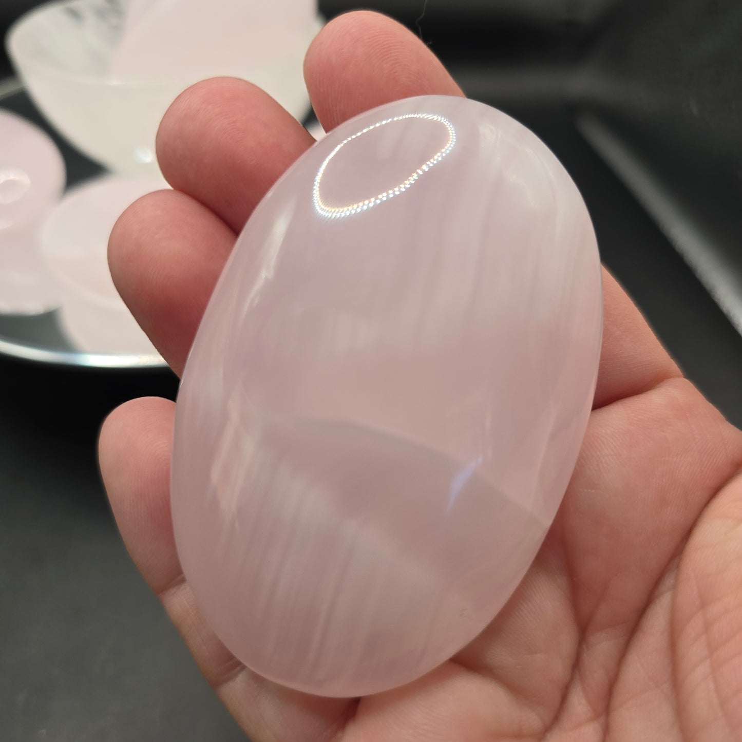 Mangano calcite palm stone