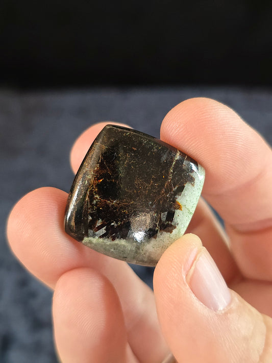 Astrophyllite cabochon